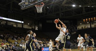 Haley Smith (22) takes a shot against NAU at the Coors Events Center Dec. 9, 2015. (Will McKay/CU Independent)