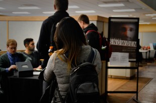 Students wait in line to buy tickets to "An Evening With Edward Snowden" Feb. 2, 2016 (Molli Nava/CU Independent)