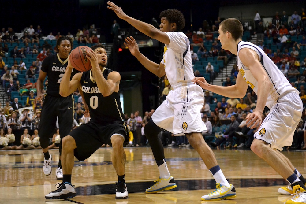 Askia Booker (0) throws a head-fake against Cal Thursday, March 2, 2014 in Las Vegas, Nev. (Nate Bruzdzinski/CU Independent)