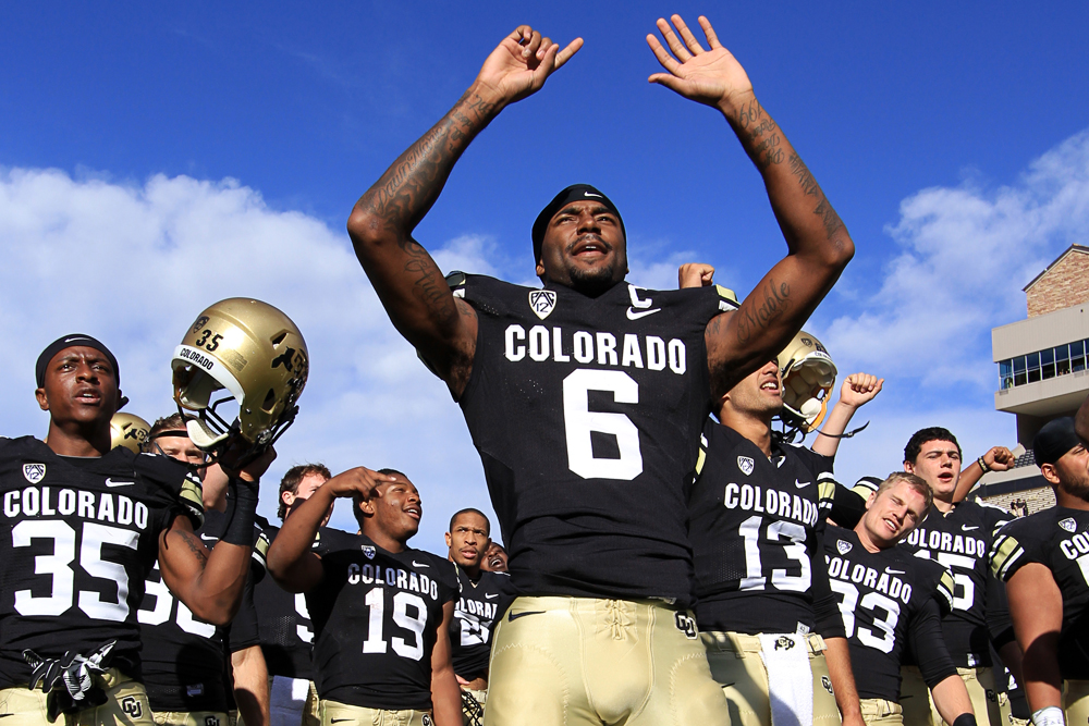 Paul Richardson celebrates with his team after the Buffs 43-10 win over Charleston Southern, Oct. 19, 2013. CUI sportswriter Tommy Wood predicts that Richardson will go in the NFL Draft. (Nigel Amstock/CU Independent)