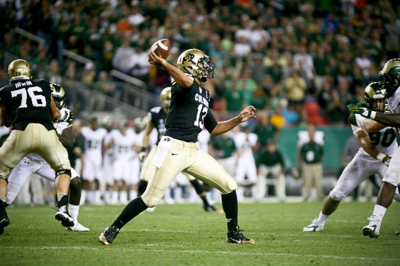 Colorado quarterback Sefo Liufau finds an open receiver during the first half of the 2014 Rocky Mountain Showdown. Liufau finished the game with 241 yards passing and two touchdowns. (James Bradbury/CU Independent)