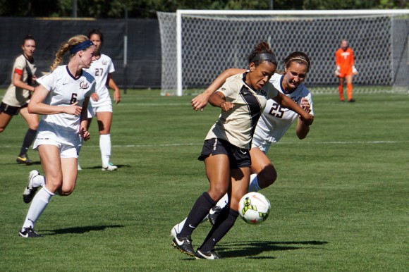 Sophomore forward Brie Hooks (20) keeps possession of the ball during the loss to California on Saturday. The Buffs started out the season 7-2, but lost in their first Pac-12 conference game this past weekend. (Allie Greenwood/CU Independent)