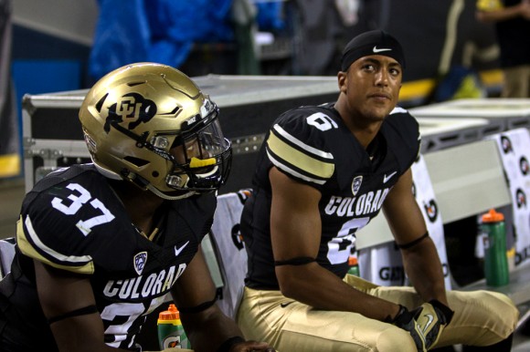 Freshman defeinsve back Evan White and senior linebacker Woodson Greer III watch the final seconds tick away and confirm a 31-17 Buffs' loss during Friday's game against CSU. This week, CU Independent writers discuss the future of Colorado's season. (Matt Sisneros/CU Independent)