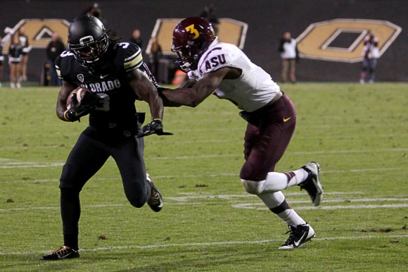 Colorado wide receiver D.D. Goodson (3) outruns Arizona State defensive back Damarious Randall (3) during the Saturday night loss. (Gray Bender/CU Independent)