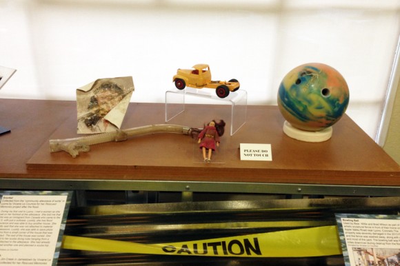An exhibit displaying toys and a photograph destroyed by the floods. Last September Boulder was hit by some of the worst floods in recent history, destroying homes and businesses all along the Front Range area. (Gray Bender/CU Independent)