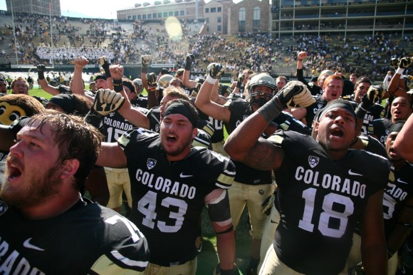 Colorado freshman fullback George Frazier (18) and teammates sing the fight song after beating Hawaii during an NCAA football game between the Colorado Buffaloes and the Hawaii Rainbow Warriors, Saturday, Sept. 20, 2014, at Folsom Field in Boulder, Colo. (Kai Casey/CU Independent)