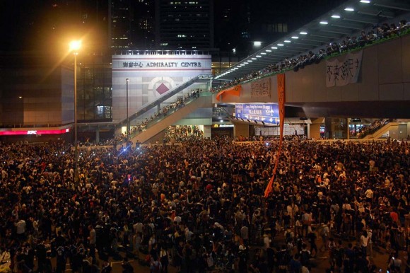 Protesters occupy Harcourt Road in front of the Admiralty Centre and the Central Government Offices at Tamar in Hong Kong at 10:45 pm, Sept. 29, 2014. (Photo Courtesy of Citobun/Wikimedia Commons)