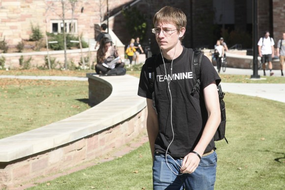 University of Colorado Boulder student Eric walks to class. (Ellis Arnold/CU Independent)