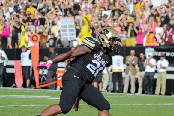Senior running back , Tony Jones (26) celebrates a touchdown that would give CU the lead over Oregon State University for the time being. The Buffs faces a challenging second half, ultimately falling 36-31 to OSU. (Matt Sisneros/CU Independent)