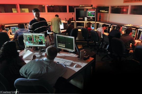 Mission operators, operational and planning-and-scheduling  software engineers, and data systems experts work together  to support the years-long operation of multiple spacecraft  simultaneously. (Photo Courtesy of LASP)