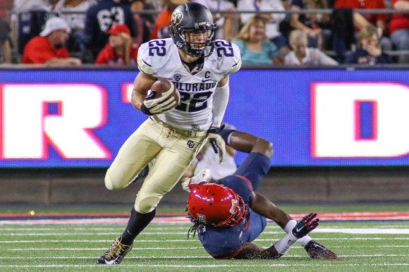 Junior reciever Nelson Spruce sheds a tackle early in the second quarter of play at Arizona Stadium. (Nigel Amstock/CU Independent)