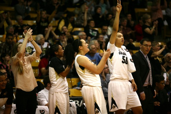 From left to right, Colorado's Lexy Kresl, Desiree Harris, Zoe Beard-Fails and Jamee Swan celebrate after their team scored during a women's NCAA basketball game between Colorado and No. 14 Arizona State, Sunday, Jan. 26, 2014, at the Coors Events Center in Boulder, Colo. (Kai Casey/CU Independent)