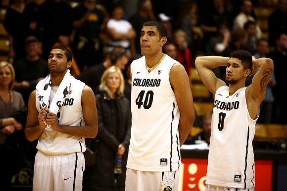 Starters, from left to right, Xavier Talton, Josh Scott and Askia Booker stand dejectedly after a loss for their last home game of the 2013-2014 season against the Arizona Wildcats. Fans are looking to Friday's game against Drexel to shed light on how the Buffs will do in their upcoming 2014-2015 season. (Kai Casey/CU Independent)