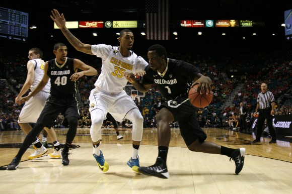 Colorado's Wesley Gordon (1) drives past California's Richard Solomon (35) during a quarterfinal Pac-12 Tournament game between Colorado and California on Thursday, March 12, 2014, at the MGM Grand Garden Arena in Las Vegas, Nev. (Kai Casey/CU Independent)
