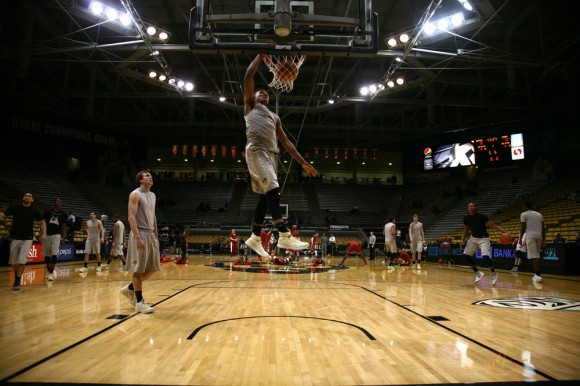 George King, throws down a one handed dunk during a pre game his freshman year. As a sophomore, King as opted to redshirt the 2014-2015 season, which head coach Tad Boyle announced during Media Day on (Matt Sisneros/CU Independent)
