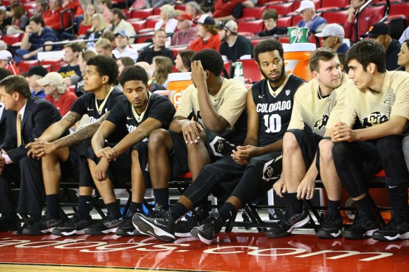 The Buff bench displays a somber look during the final seconds of regulation. The Bulldogs defeated the Buffs 64-57 at Stegeman Coliseum. (Nigel Amstock/CU Independent)