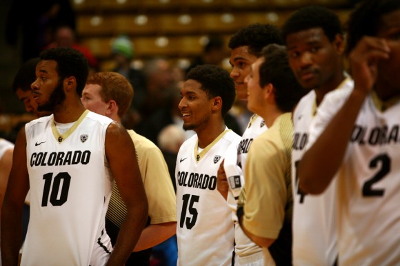 Colorado freshman guard Dom Collier (15) smiles after the Buffs win against Air Force earlier in the season on Tuesday, Nov. 25, 2014, at the Coors Events Center in Boulder, Colo. (Kai Casey/CU Independent)