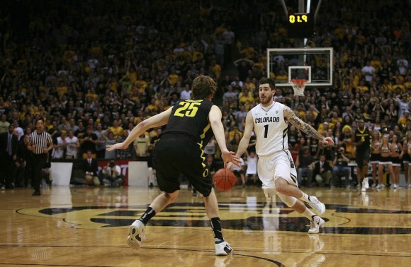 Senior guard Nate Tomlinson races down the court as the final seconds tick off the clock at the Coors Event Center on Feb 4, 2012. Tomlinson was fouled going to the basket, and made a free throw giving the Buffs a 72-71 lead over the Oregon Ducks. Tomlinson finished with seven points. (CU Independent/James Bradbury)