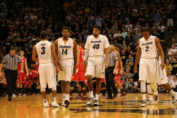 Colorado basketball players Xavier Talton (3), Tory Miller (14), Josh Scott (40) and Xavier Johnson (2) walk away defeated after a game against Utah on Saturday Feb. 7, 2015. (Chanelle Tong/CU Independent)