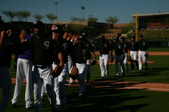 The Colorado Rockies celebrate their 5-2 win over the Giants at Spring Training in Scottsdale, Arizona. Courtesy of Justin Guerriero