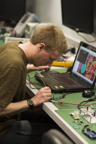 Aerospace student Franklin Hinckley is diligently working on the star camera board. The star camera is responsible for taking pictures of stars and creating a map that allows for tracking of the PolarCube. (Alexander Joyce/CU Independent)