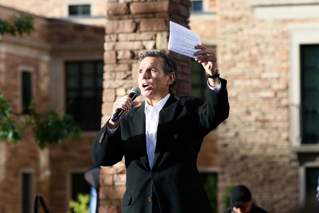 Former Denver Mayor and Secretary of Transportation and Energy Federico Peña, addresses attendees of the My Country, My Vote immigration rally on Farrand Field. (Nigel Amstock/CU Independent)
