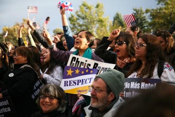People cheer and shout during the speeches at the immigration rally on Farrand Field before the GOP debate in Boulder Wednesday night. (Danny Anderson/CU Independent)