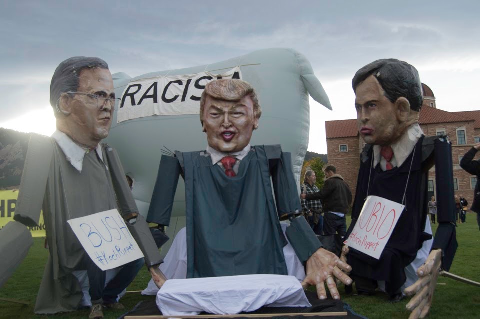14-foot puppets of the 2016 Republican candidates - Jeb Bush, Marco Rubio, and Donald Trump held a mock-debate outside the Coors Event Center at the University of Colorado, Boulder, where the 2016 GOP debate was being held on Wednesday, Oct. 28, 2015.