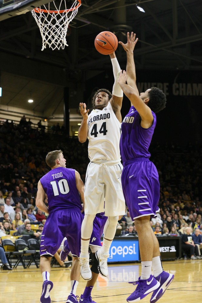 Junior guard Josh Fortune elevates towards the basket during the first half of play at the Coors Event Center. Fortune recorded 17 points against the Portland Pilots. Nov. 20, 2015 (Nigel Amstock/CU Independent)