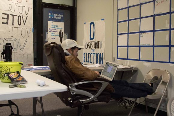 At Boulder Students for Hillary campagn HQ a student watches the returns come in. (Jackson Barnett/CU Indpentned)