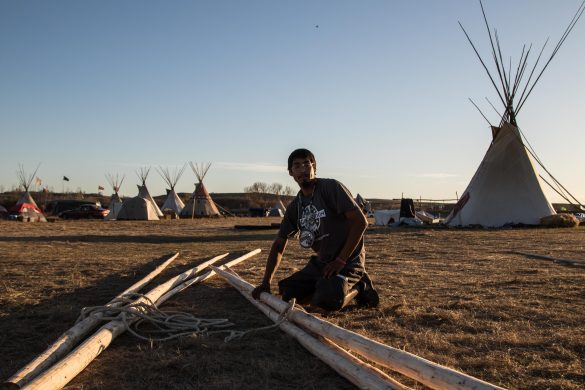 Photos: How to build a teepee at DAPL