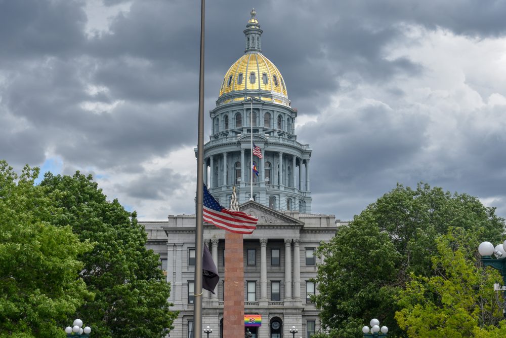 The Colorado State Capitol Building displaying a Pride flag.