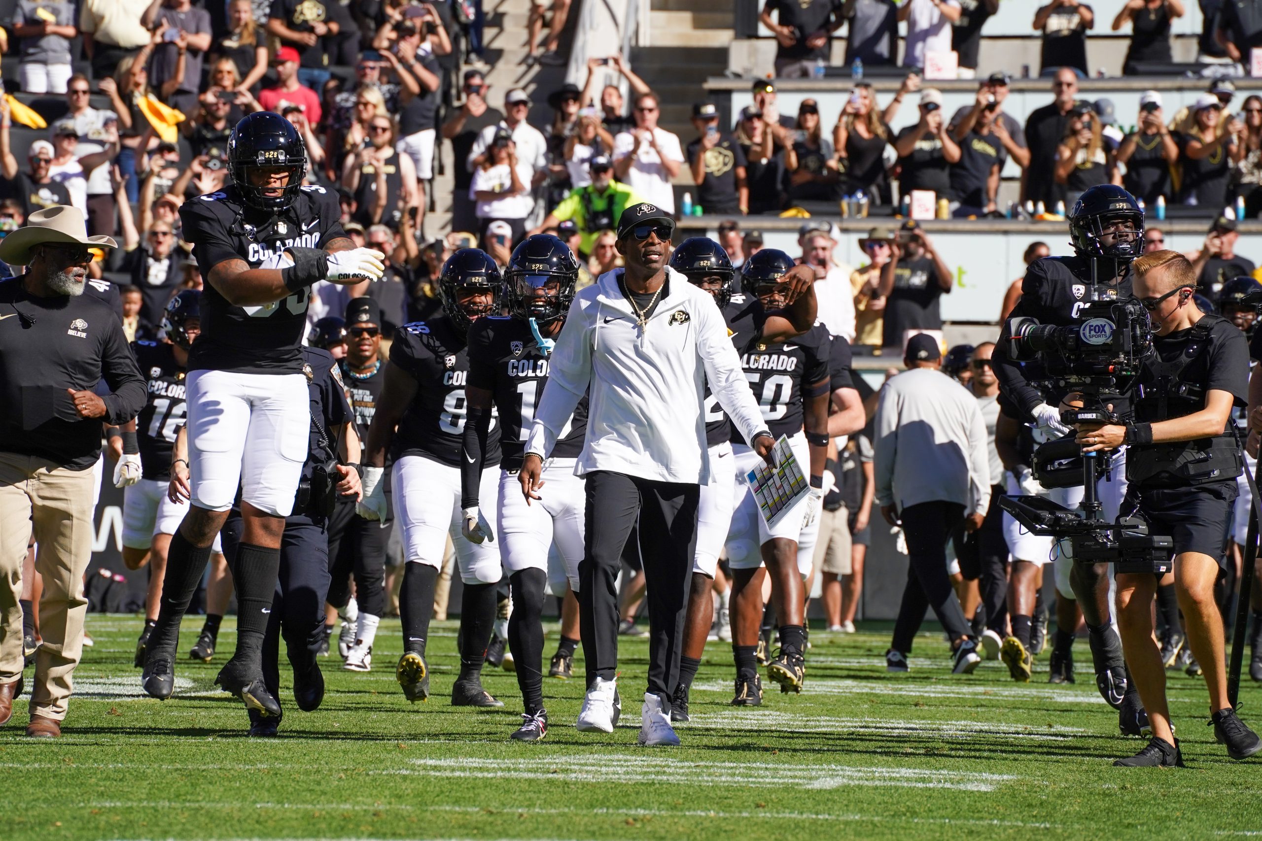 Colorado fans storm field after Deion Sanders' win over Nebraska